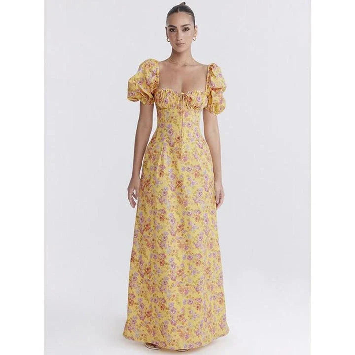Elegant long maxi summer dress in blue with a flattering fit and flare silhouette, perfect for parties and nights out.