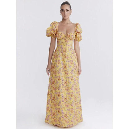 Elegant long maxi summer dress in blue with a flattering fit and flare silhouette, perfect for parties and nights out.