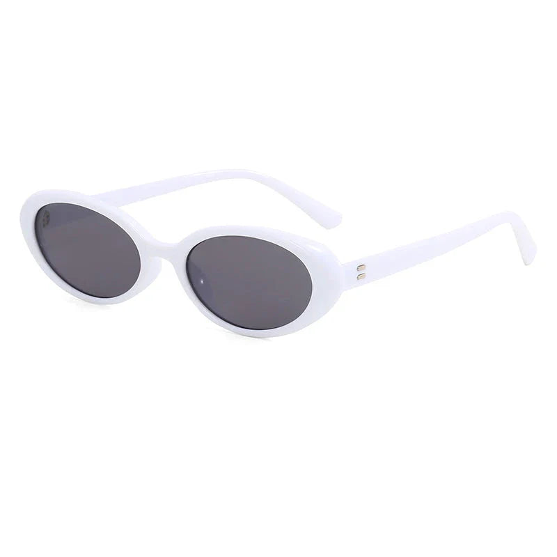 Oval-shaped women's sunglasses in a white and grey colour, offering UV protection and a stylish, retro-inspired design.
