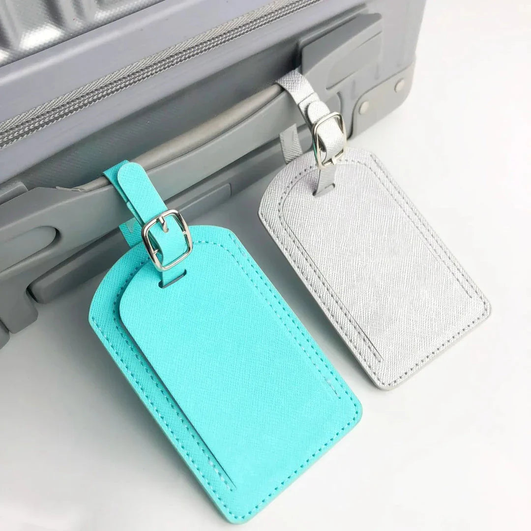 Premium PU leather luggage tag with secure strap and compact design for modern travellers