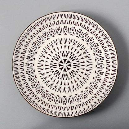 Elegant ceramic plates with vibrant, whimsical prints in a variety of enchanting designs