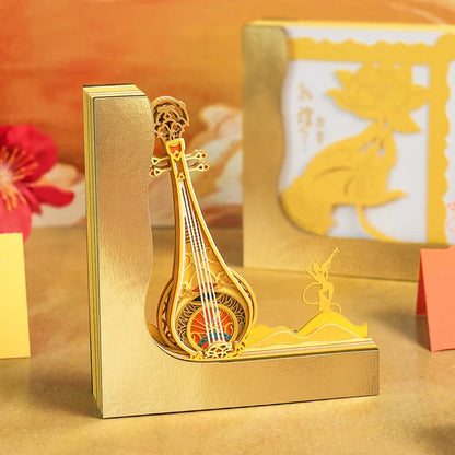 Charming desktop paper sculpture with three-dimensional notepad design, available in Dunhuang Pipa cover colour