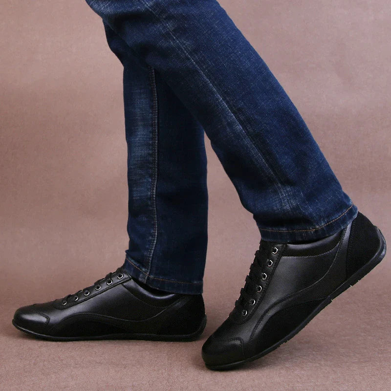 Soft, durable cowhide leather shoes with a rounded toe and car-stitch detailing for a sophisticated business casual look.