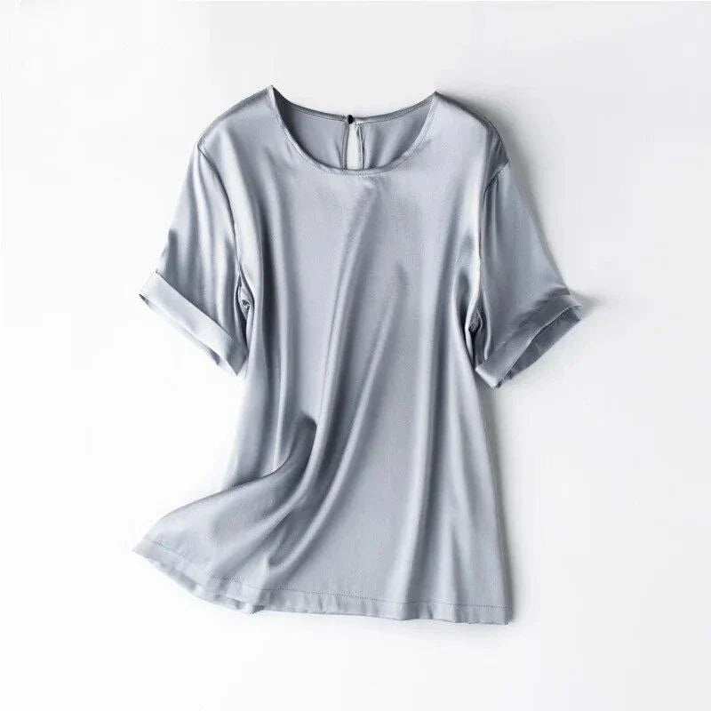Elegant navy silk t-shirt with a classic, versatile design for the modern British woman's summer wardrobe