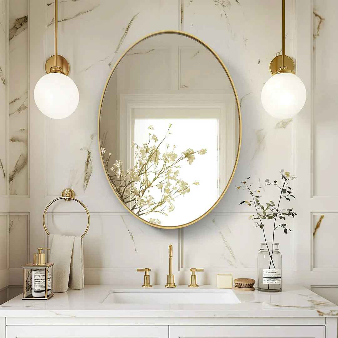 Elegant oval gold wall mirror with brushed gold metal frame, contemporary decorative accent for bedrooms, living rooms, and hallways.