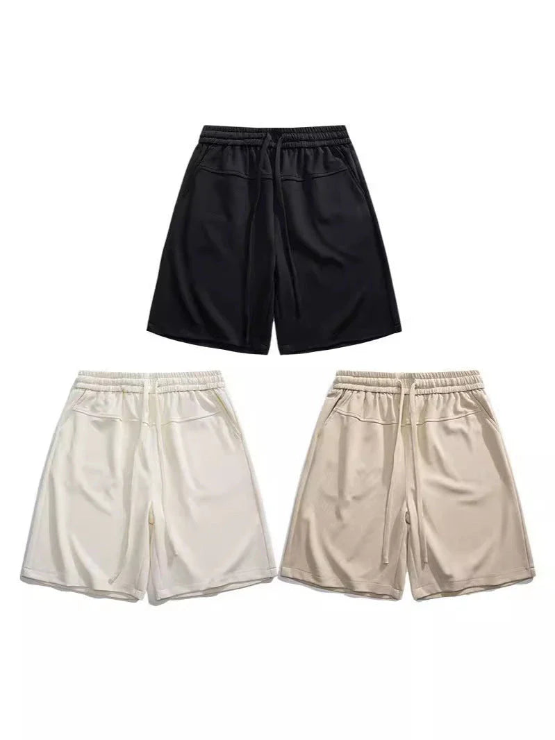 Premium straight-fit drawstring trousers in white, khaki, and black colours for stylish British men