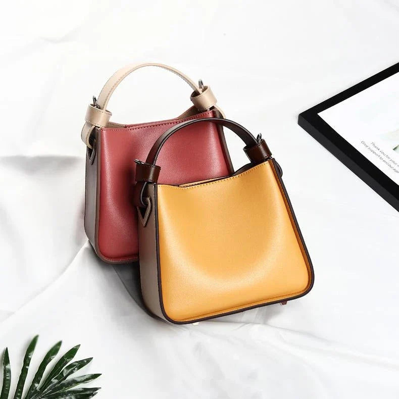 A stylish microfibre leather tote bag with a chic bucket shape and ruched detailing, perfect for the modern British woman.