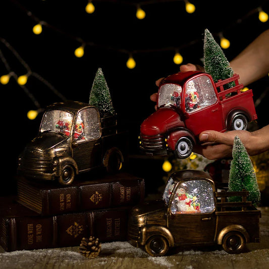 A festive car-mounted crystal ball ornament with a bronze snowman design, playing classic Christmas music.