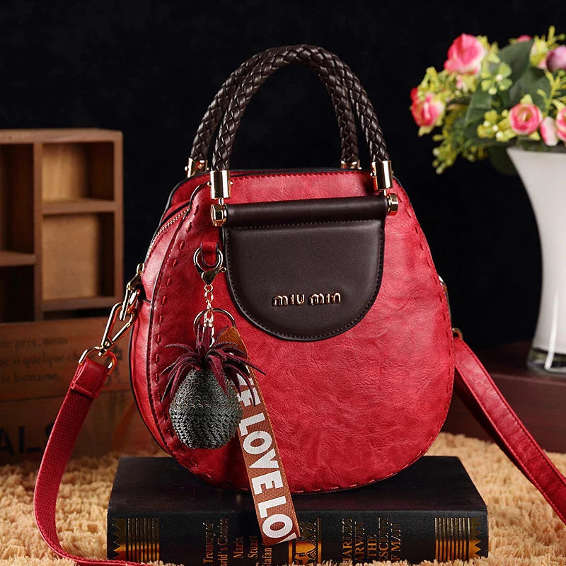Fashionable women's one-shoulder diagonal bag in caramel, nude pink, black, wine red, and retro brown colours