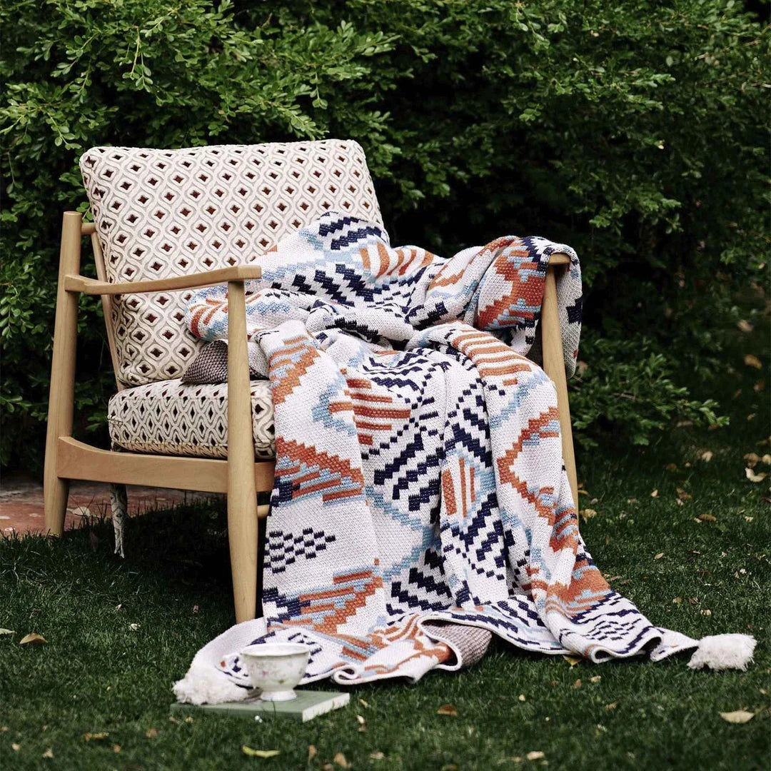 Boho geometric design cotton blanket in various sizes, perfect for indoor and outdoor use