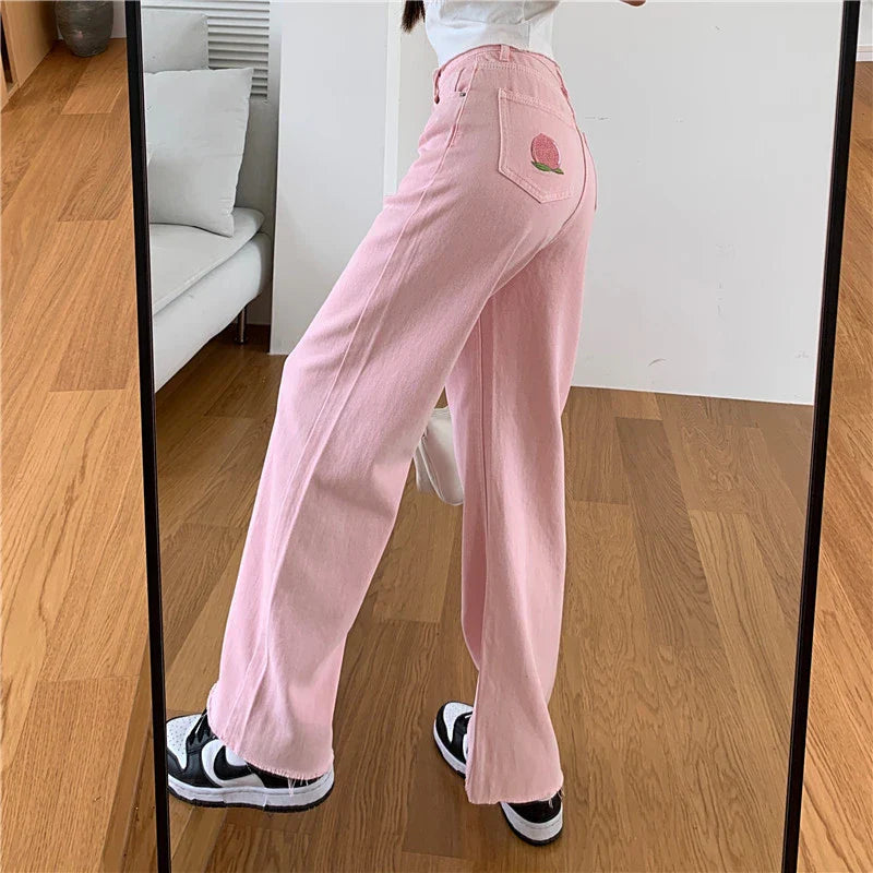 Premium cotton denim high-waist wide-leg trousers in a flattering, figure-hugging silhouette