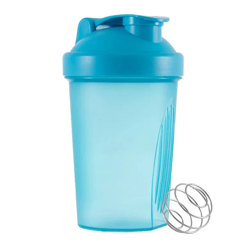 Premium protein shaker bottle with stainless steel whisk ball, BPA-free plastic, and leak-proof design for on-the-go fitness enthusiasts in the UK.