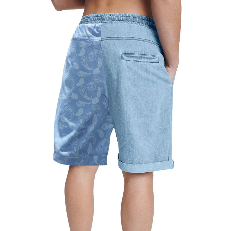 Relaxed-fit sports shorts in light blue and denim blue mosaic patterns, designed for casual everyday wear
