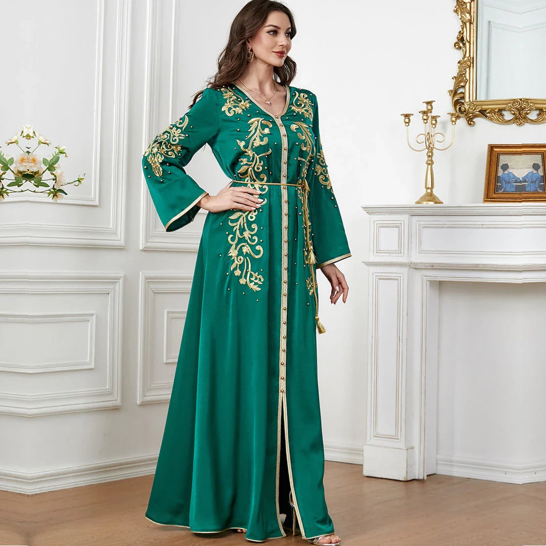 Elegant long-sleeve dress with floral embroidery in a sophisticated sapphire blue colour, suitable for British women
