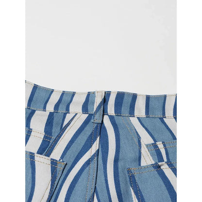 Women's high-waist striped denim trousers in a stylish blue colour, featuring a unique pattern and functional design for everyday wear.