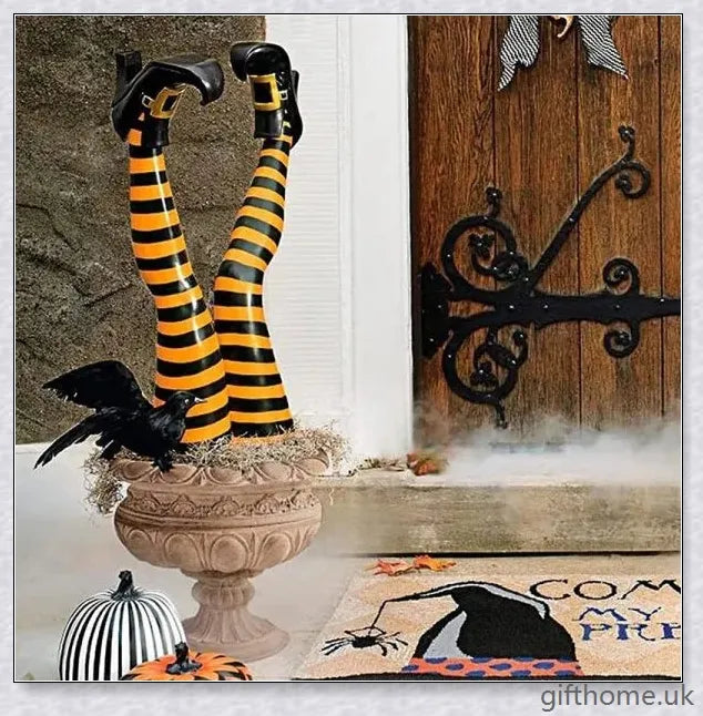 Animated witch legs in various colours, including purple, yellow, and black and white, kicking and moving to create a spooky Halloween display