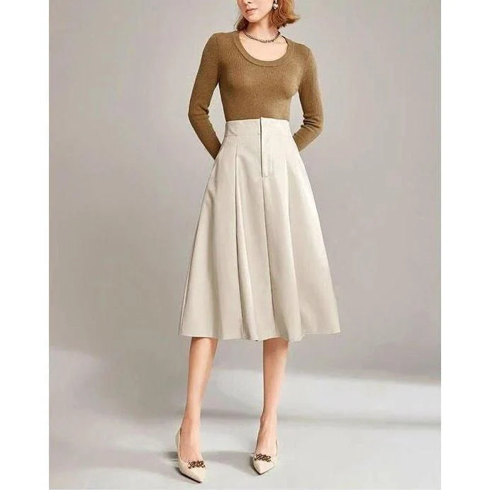 High-waist, A-line black PU leather skirt with a knee-length design for a sophisticated, elegant look