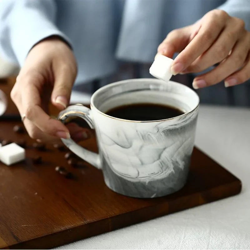 Elegant marble-inspired porcelain coffee mug with a sleek and sophisticated British design