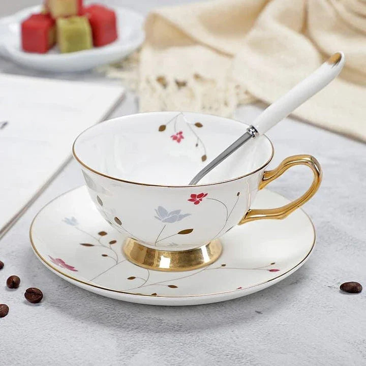 Charming floral porcelain tea set with cup, saucer, and spoon in a variety of delicate colour options