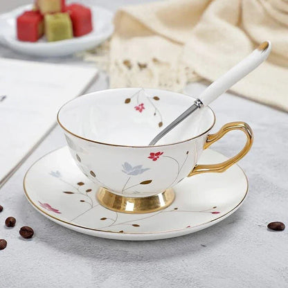 Charming floral porcelain tea set with cup, saucer, and spoon in a variety of delicate colour options