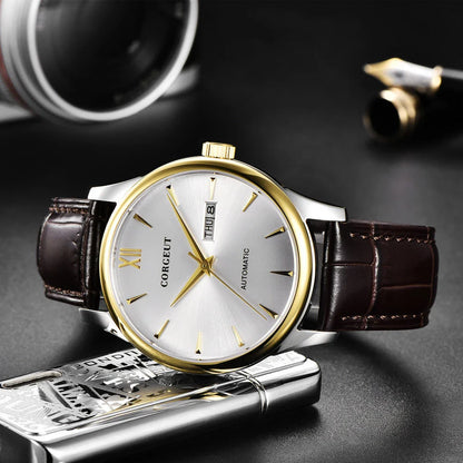 A sophisticated automatic mechanical watch with a gold/white or gold/black face, stainless steel case, and genuine leather strap