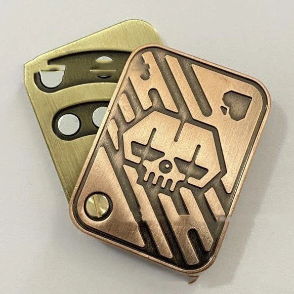 Premium British-made fingertip peg-top decompression toy in silver, copper, and skull designs