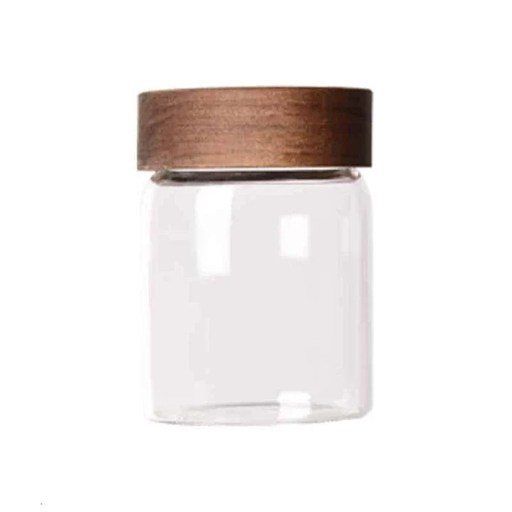 Premium glass storage jars with wooden lids in various sizes, designed for stylish and functional kitchen organisation