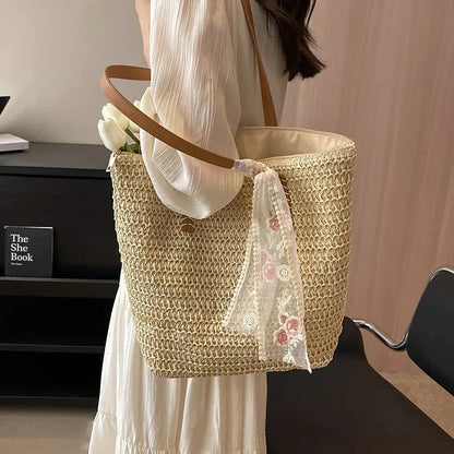 Elegant handcrafted woven straw tote bag in beige colour, perfect for summer outings and carrying essentials