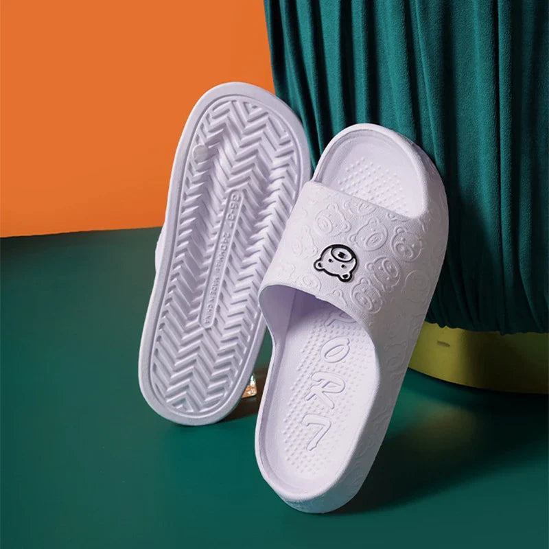Soft, cosy bear-themed slippers with non-slip soles for comfortable indoor wear