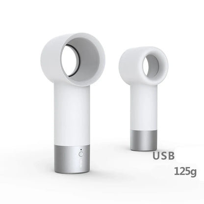 Compact, cordless, and bladeless fan with a sleek, white design and a powerful 900mAh battery for portable cooling.