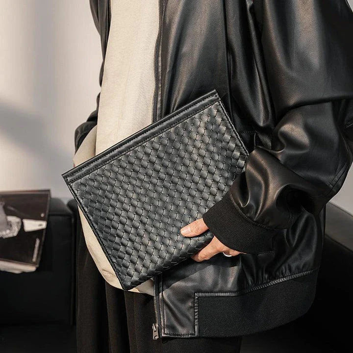 Premium hand-woven black leather briefcase with multiple pockets and adjustable shoulder strap