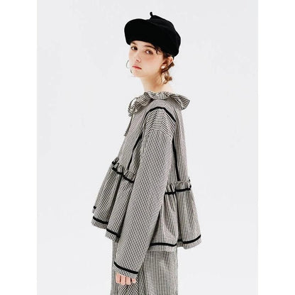 Autumn Elegance Checkered Shirt with Doll Collar, a stylish long-sleeved shirt in a classic black and white checkered pattern