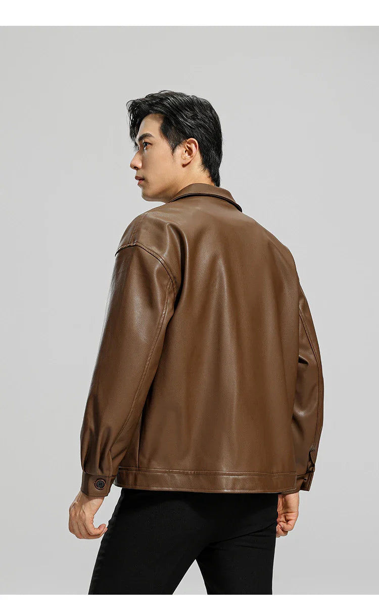 Handsome men's leather motorcycle jacket with lapel collar, dimensional pockets, and durable PU leather construction