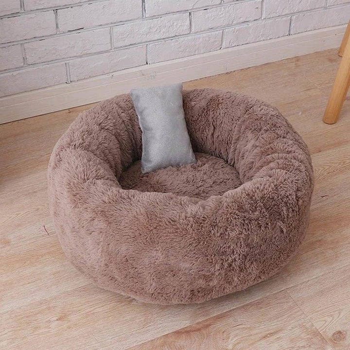 Cosy and comfortable fleece round cat bed in pink colour, perfect for your beloved feline friend to relax and unwind.