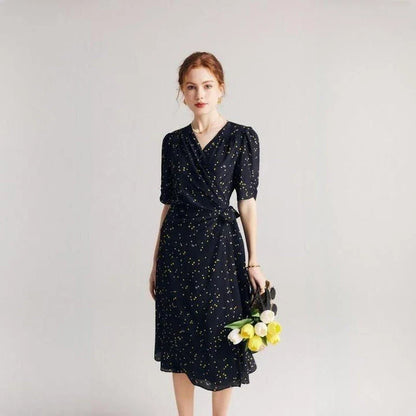 Elegant black polka dot silk wrap dress for women with chic V-neck and empire waistline
