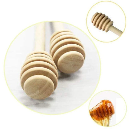 Handcrafted wooden honey spoon with a natural beeswax finish, showcasing the elegant design and timeless British craftsmanship.