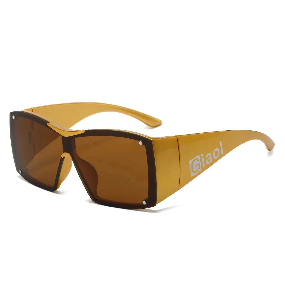 Oversized square sunglasses with black lenses and a durable plastic frame, offering UV400 protection and adaptive photochromic technology.