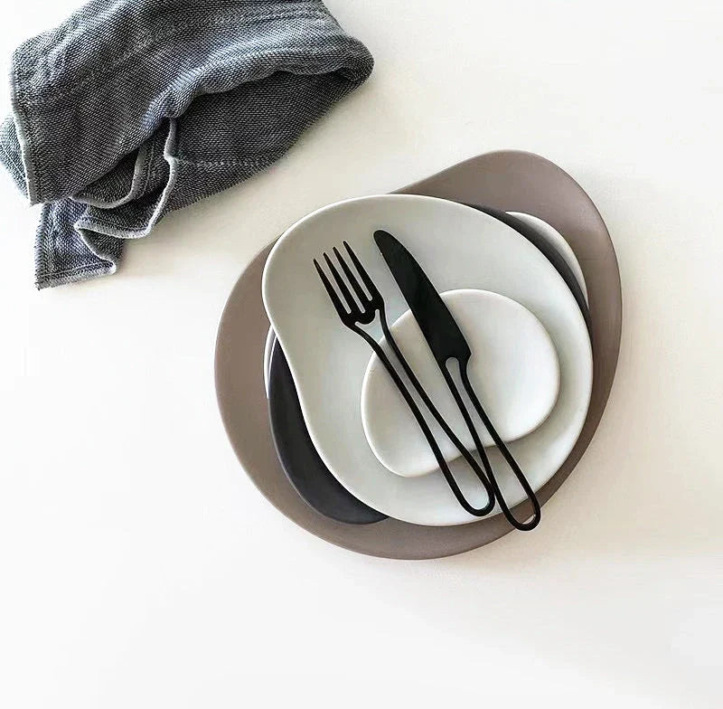 Sophisticated 304 stainless steel cutlery set with sleek black finish for elegant dining in the UK