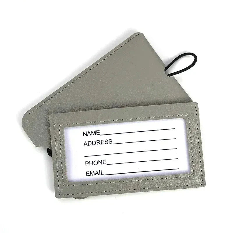 Premium PU leather luggage tags in a vibrant gray colour, with a discreet pull-out information card for easy customization.