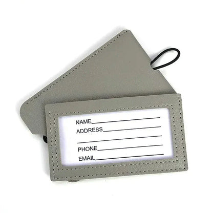 Premium PU leather luggage tags in a vibrant gray colour, with a discreet pull-out information card for easy customization.