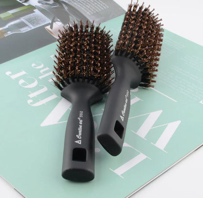 Premium black detangling hair brush with ergonomic long handle for smooth, tangle-free hair and healthy scalp