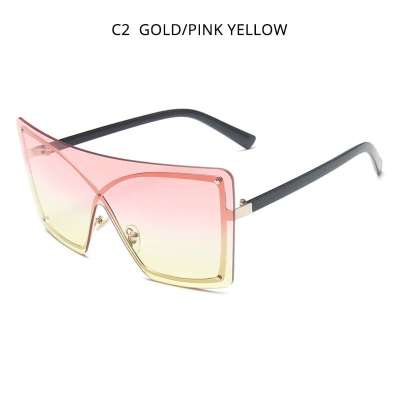 Fashionable oversized flat top sunglasses with gradient lenses and a sleek, rimless plastic frame