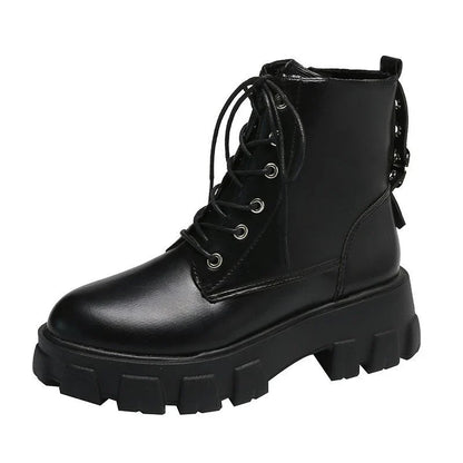 Stylish women's leather boots with a handsome locomotive design, durable rubber soles, and a comfortable round toe for autumn and winter wear.