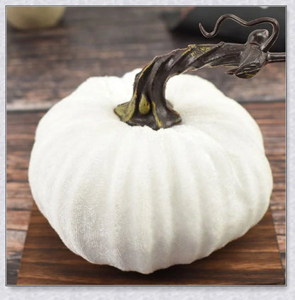 Punki Mini Velvet Halloween Pumpkins in various autumn colours, including orange, burgundy, green, and navy.