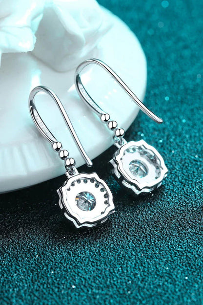 Pair of 925 sterling silver earrings featuring sparkling moissanite stones and zircon accents