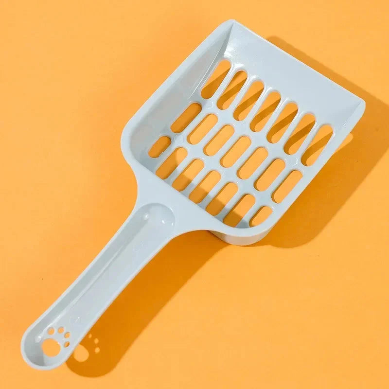 A large, high-quality cat litter scoop made of durable plastic with a hollow design for efficient cleaning.
