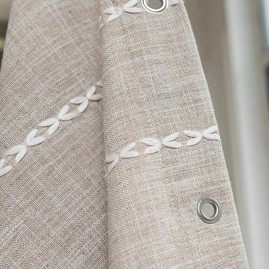 Premium bohemian tassel shower curtain with unique stitching design, waterproof coating, and durable linen blend material for a relaxing bathroom oasis
