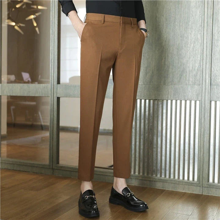 Premium men's suit trousers in a variety of colours, featuring a subtle textured drape and exceptional stretch for all-day comfort and style.