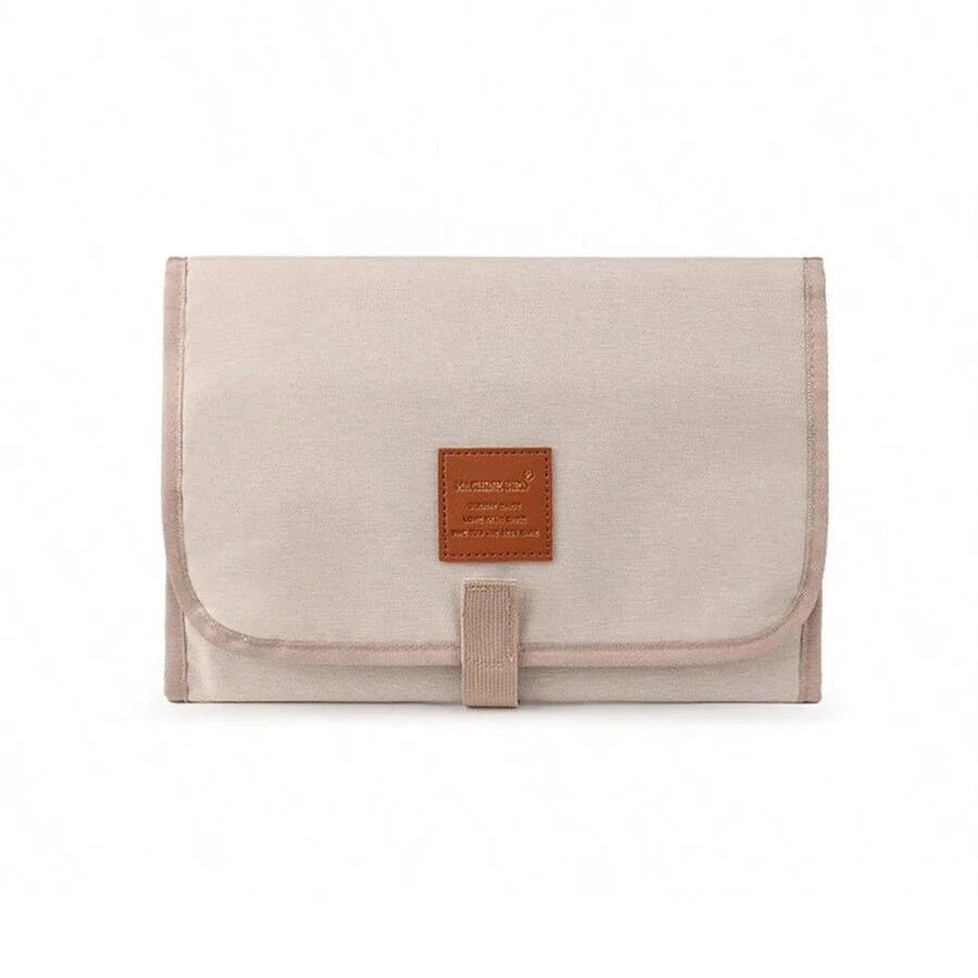 Premium waterproof changing pad for babies, featuring a compact, foldable design and soft, skin-friendly materials for a comfortable, hygienic nappy changing experience on the go.