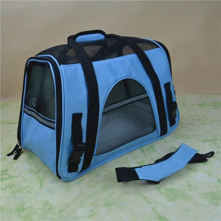 Portable pet carrier bag made of durable nylon with breathable mesh panels for your dog or cat's comfort during travel